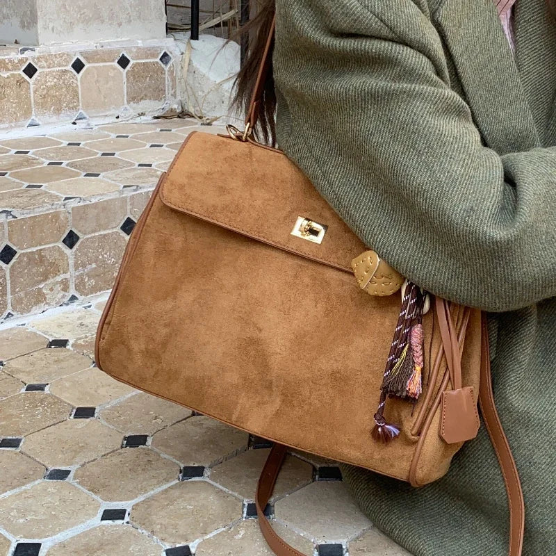 Structured modern suede handbag