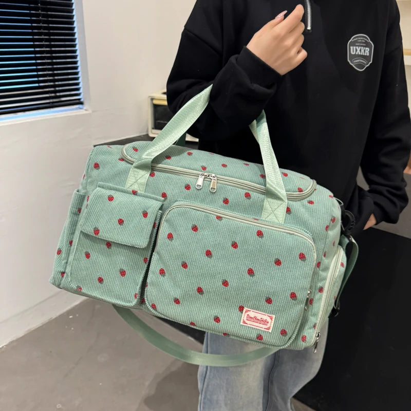 Corduroy travel toiletry bag with shoulder strap