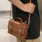 Compact leather crossbody bag