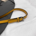 Structured suede handbag with minimalist shape