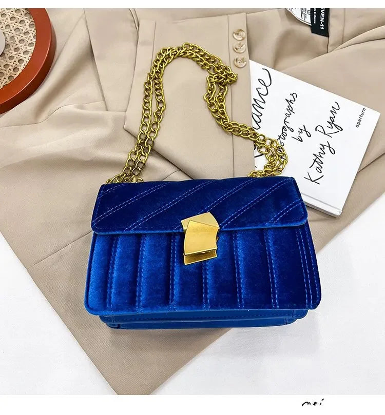 Corduroy handbag with chain and flap closure
