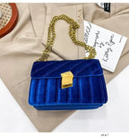Corduroy handbag with chain and flap closure
