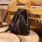 Compact drawstring pouch in leather