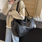 Slim leather duffle bag
