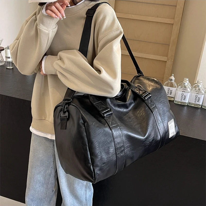 Slim leather duffle bag