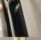 Small structured leather crossbody bag