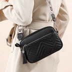 Textured leather crossbody bag