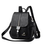 Contrast-strap leather backpack