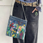 Embroidered floral denim shoulder bag