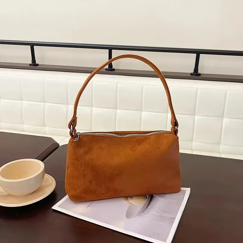 Structured suede shoulder bag