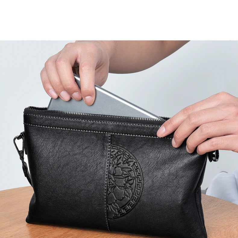 Minimalist leather clutch with detachable strap