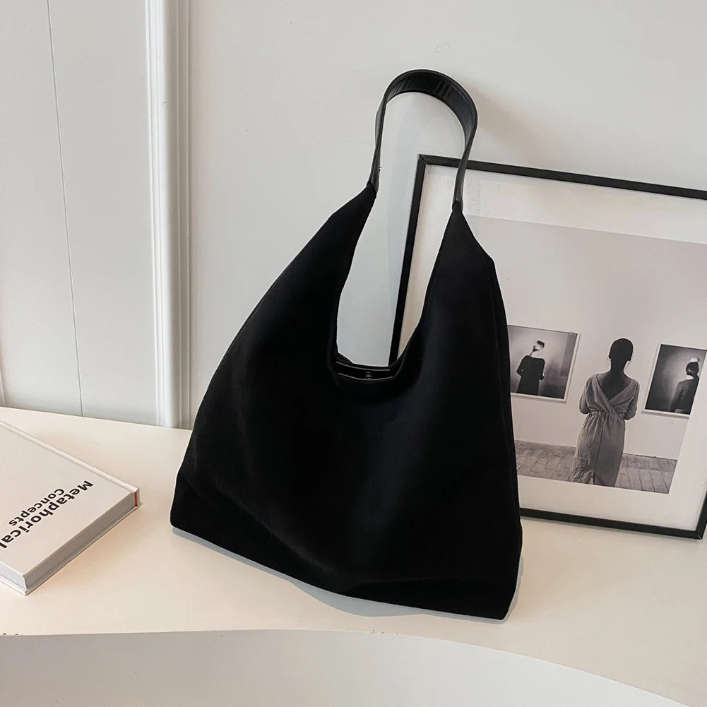 Minimalist suede shoulder slouch bag