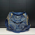 Elegant floral embroidered denim handbag with chain handle