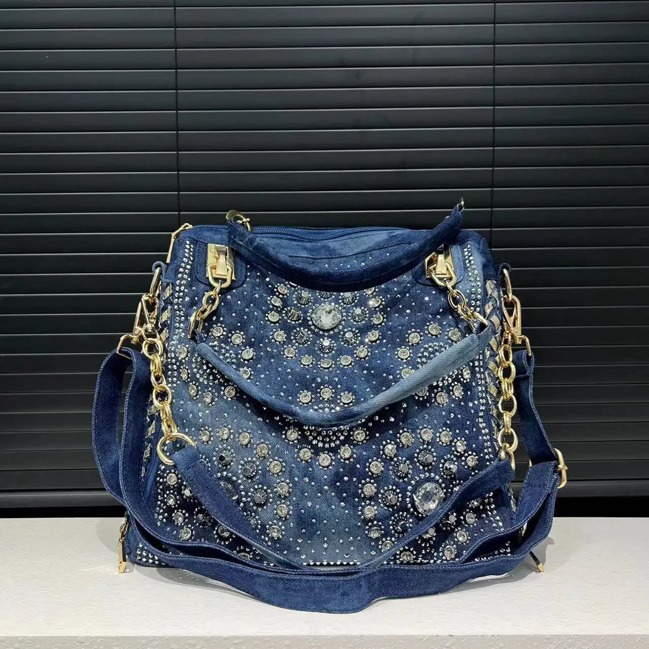 Elegant floral embroidered denim handbag with chain handle