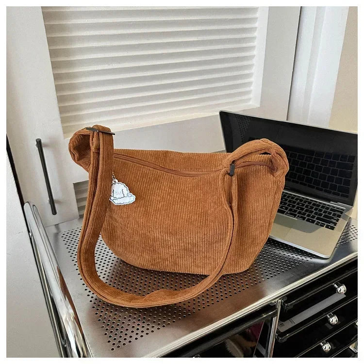 Corduroy handbag with adjustable shoulder strap