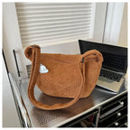 Corduroy handbag with adjustable shoulder strap