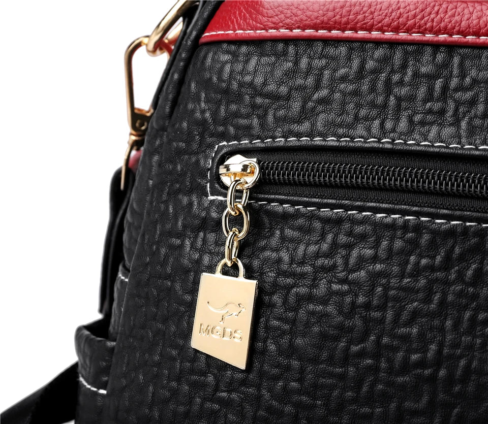 Contrast-strap leather backpack