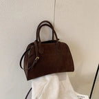 Suede handbag with double handle
