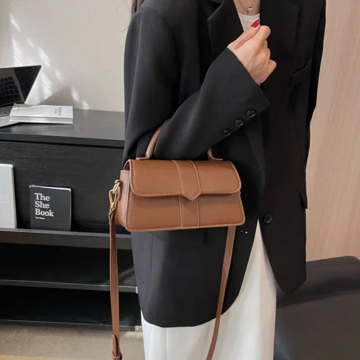 Compact leather sling bag for daily essentials