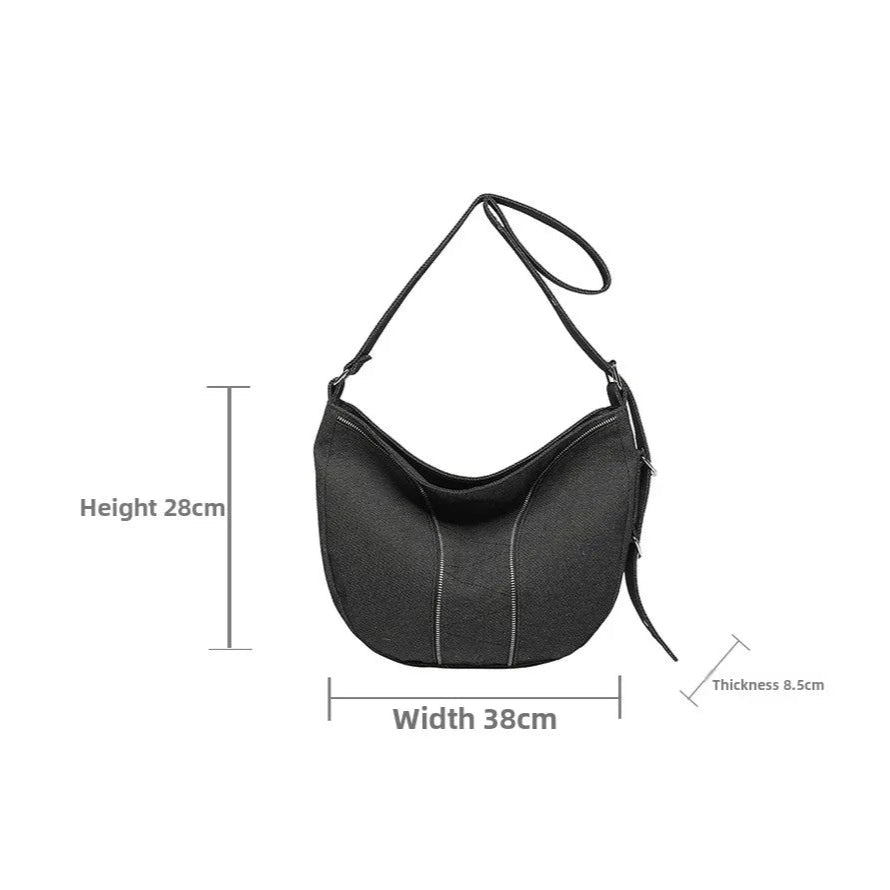 Soft washed denim shoulder bag with casual fold design