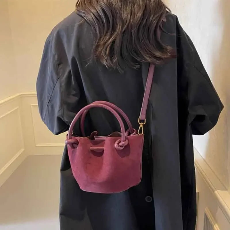 Everyday suede handbag with strap