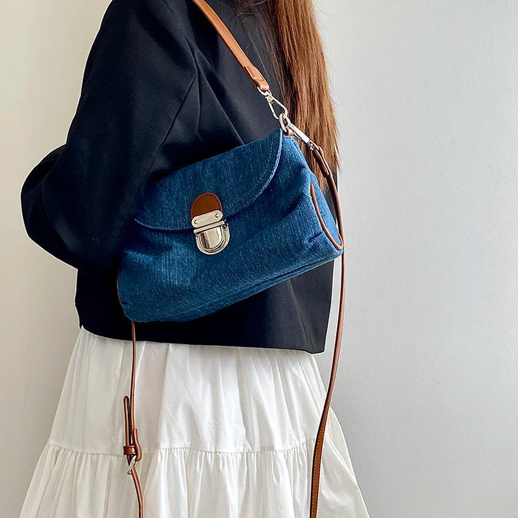 Denim handbag with leather handles