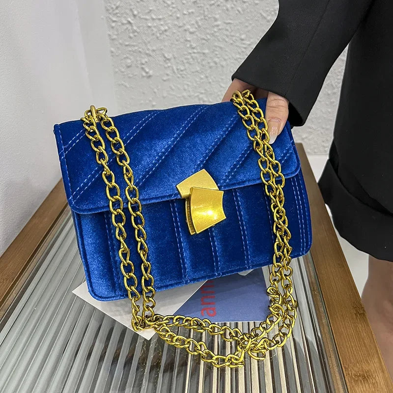 Corduroy handbag with chain and flap closure