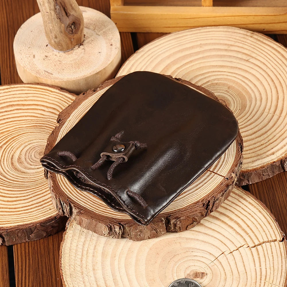 Compact drawstring pouch in leather