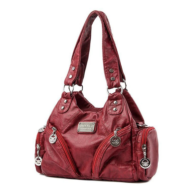 Leather shoulder bag with side pockets