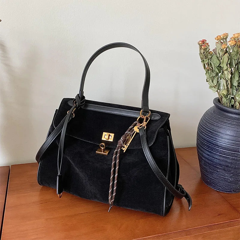 Chic suede handbag for work and city style