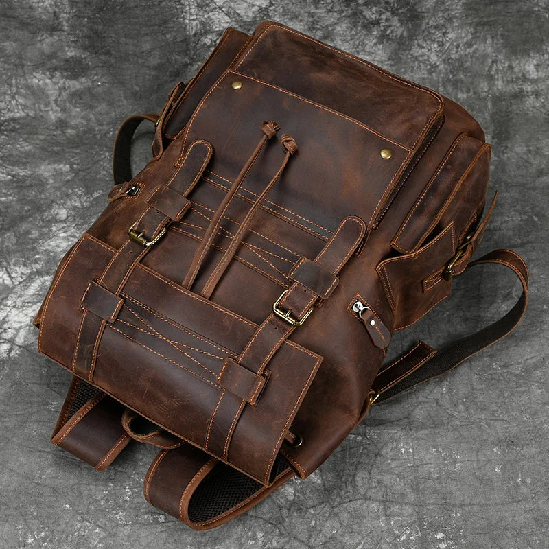 Multi-compartment leather rucksack