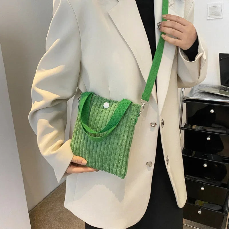 Corduroy handbag with front button detail