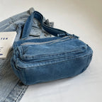 Classic denim shoulder handbag with zipper closure