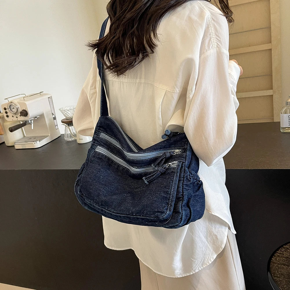 Classic denim shoulder handbag with zipper closure