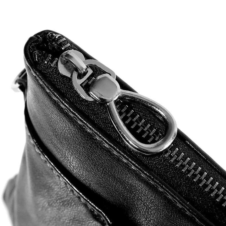 Minimalist leather clutch with detachable strap