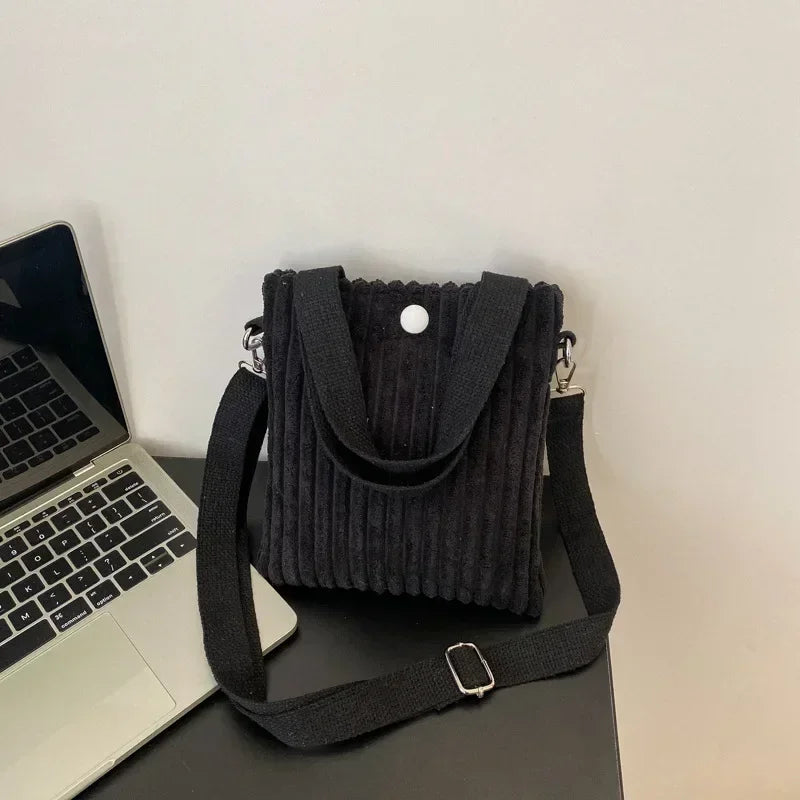 Corduroy handbag with front button detail