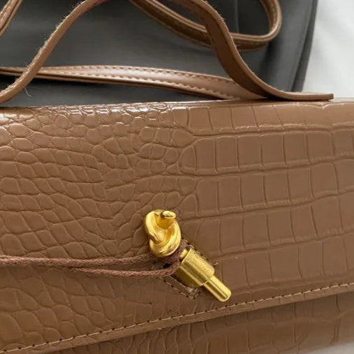 Compact leather handbag