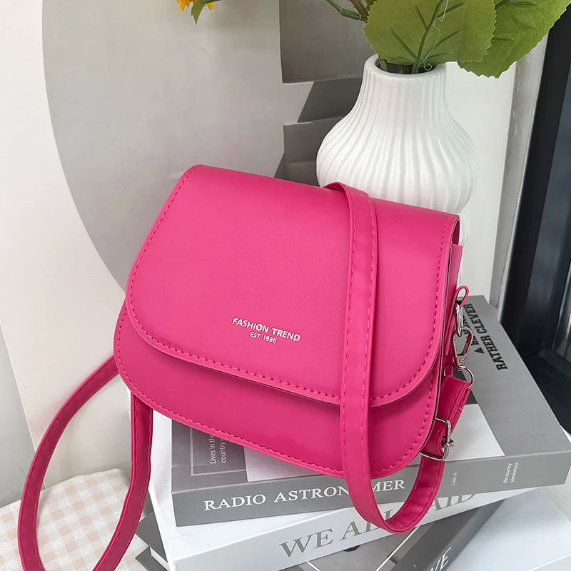 Compact leather sling crossbody
