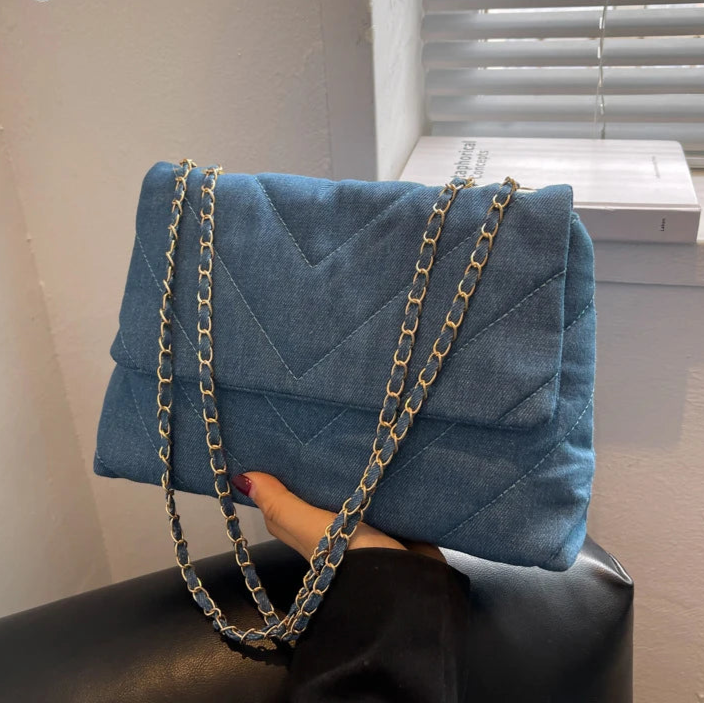 Flap-style denim shoulder handbag