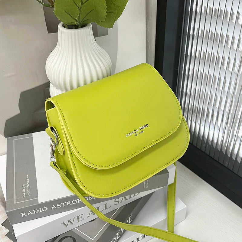 Compact leather sling crossbody