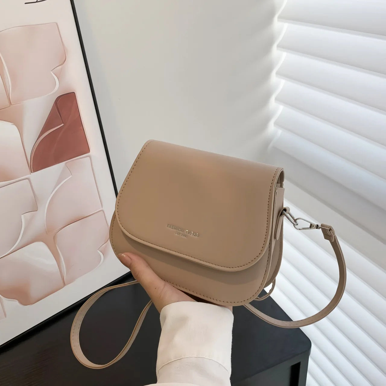 Compact leather sling crossbody
