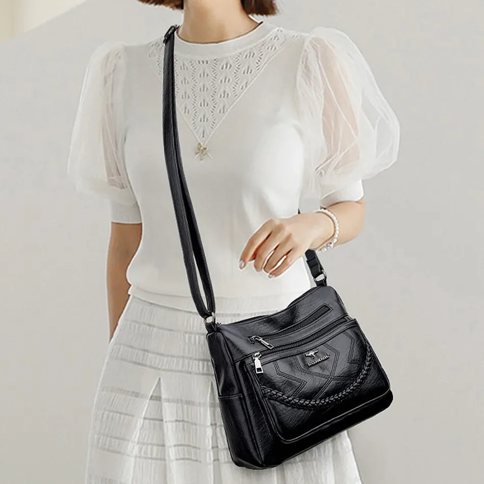 Leather shoulder bag with adjustable strap
