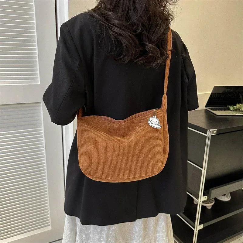 Corduroy handbag with adjustable shoulder strap