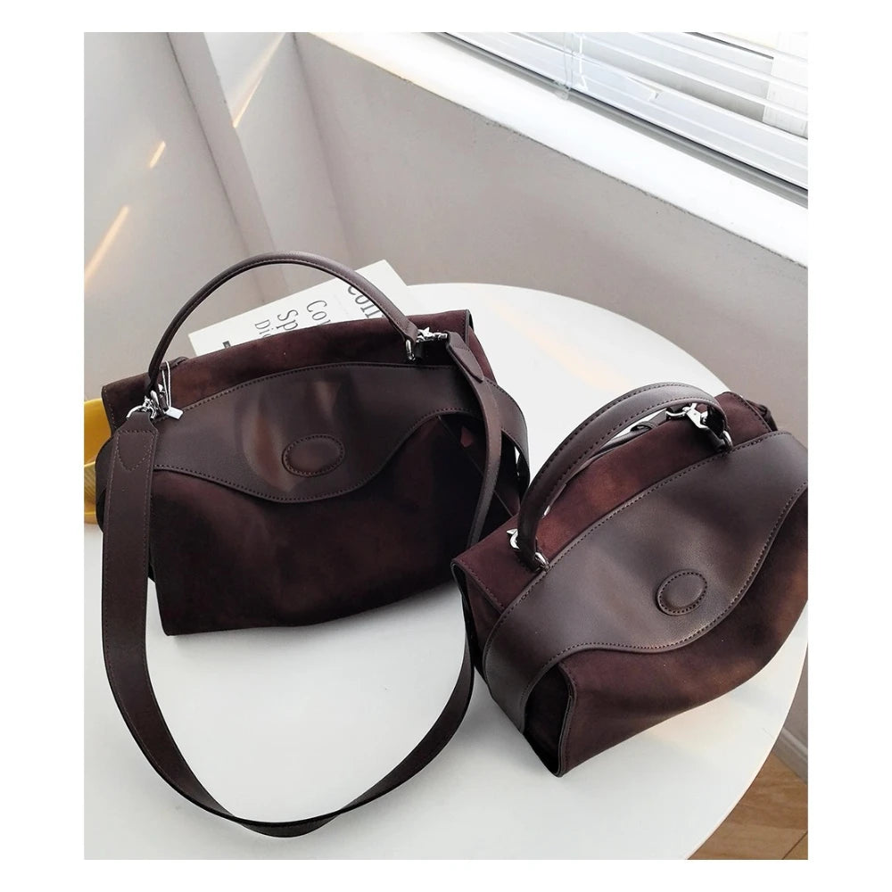 Suede handbag with subtle colors
