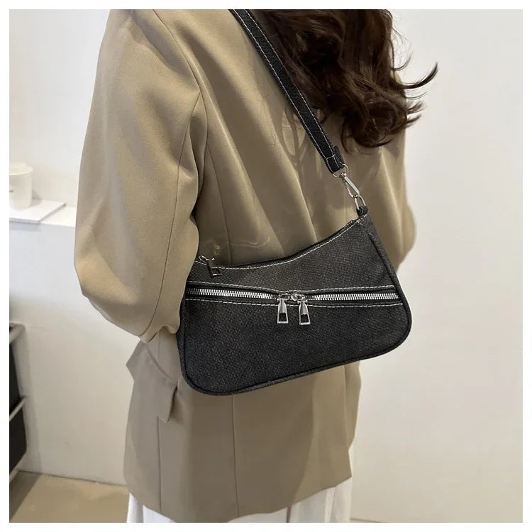 Denim evening clutch bag