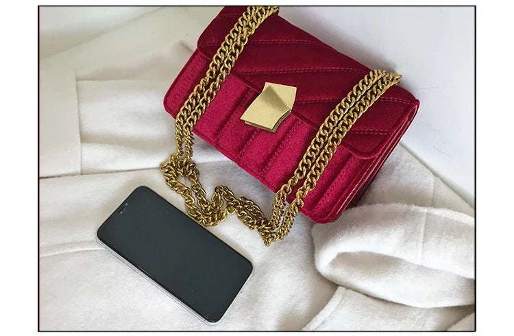 Corduroy handbag with chain and flap closure
