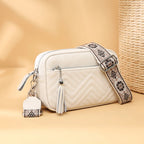 Textured leather crossbody bag