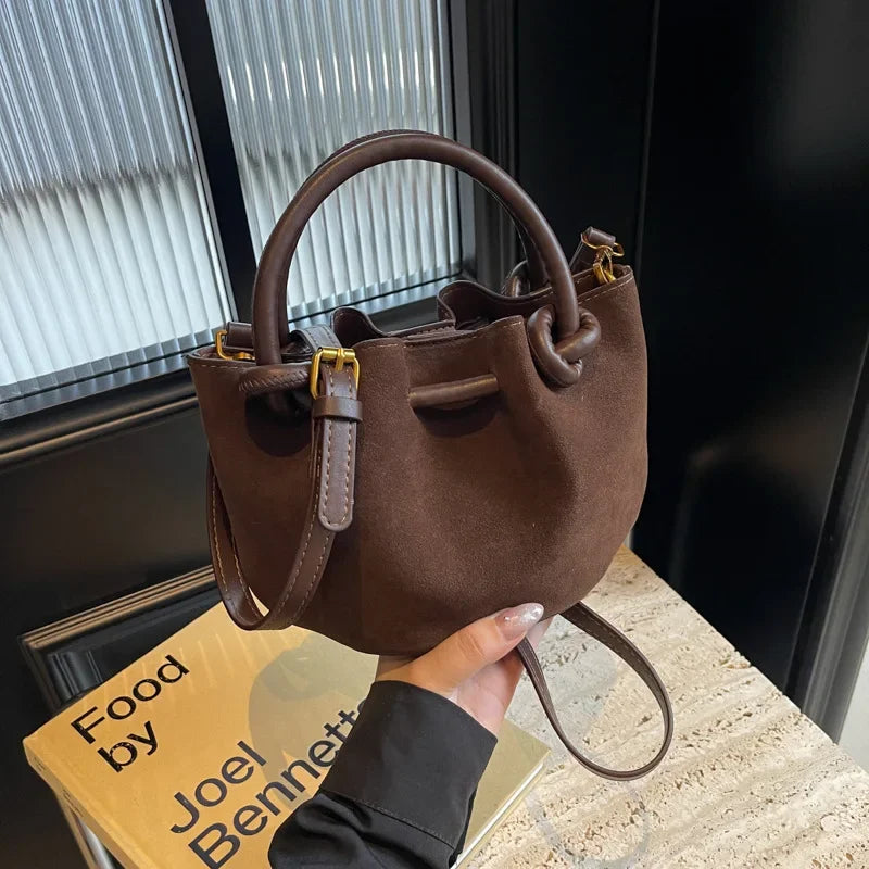 Everyday suede handbag with strap