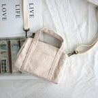 Corduroy purse with detachable shoulder strap