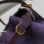 Small brown corduroy handbag with top handle